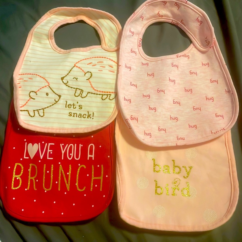 4 pack, baby girl bibs, never been used